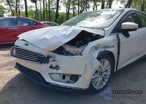 2016 Ford Focus Titanium from USA, damaged, VIN 1FADP3N22GL239282